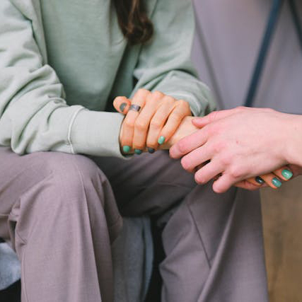 Therapist speaking with a client in person